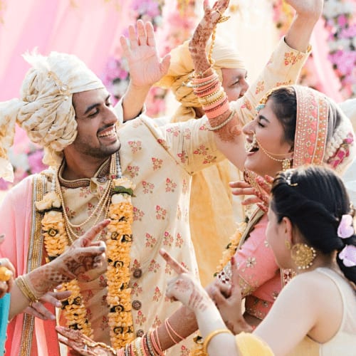A couple sharing a joyful moment at a wedding celebration